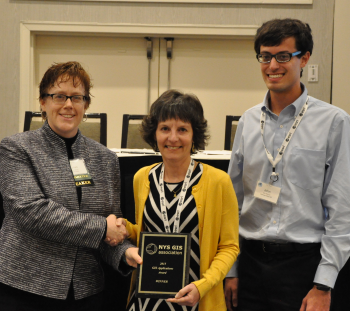 Linda Rockwood accepting the 2015 Applications Award on behalf of Mohawk Valley GIS for the NY Snowmobile Web Map and Trip Planner.